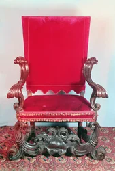 Fauteuil de style baroque, noyer sculpté, recouvert de velours